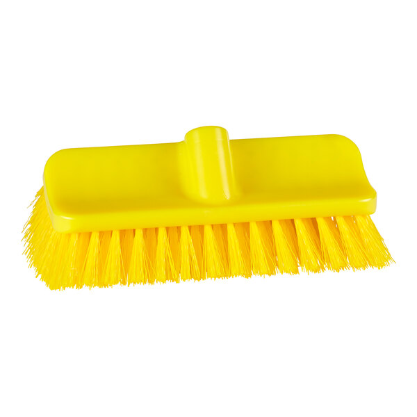 A close up of a Remco yellow brush head with bristles.