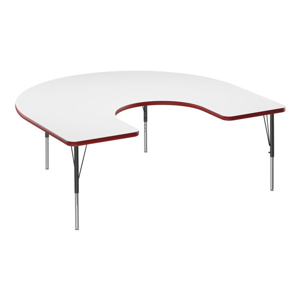 A white table with a half-moon shaped top and red edge.