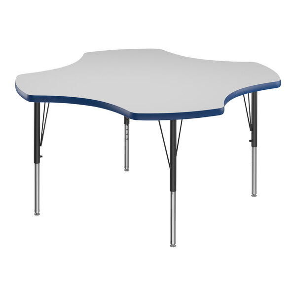 A white Correll activity table with blue T-mold and black legs.