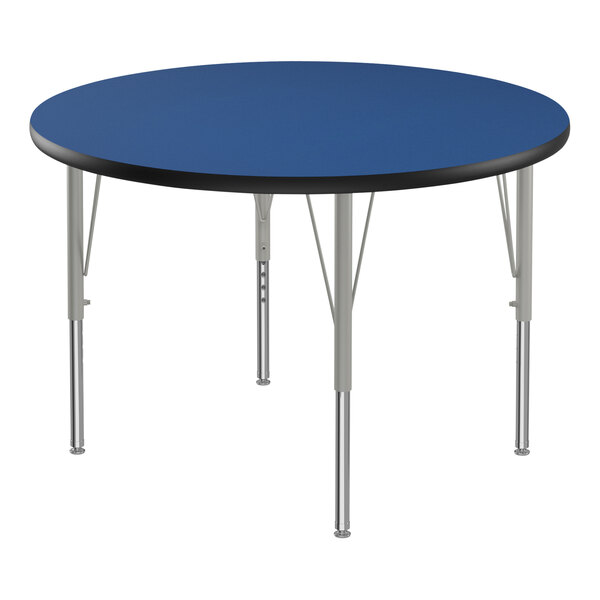 A blue Correll round activity table with silver legs.