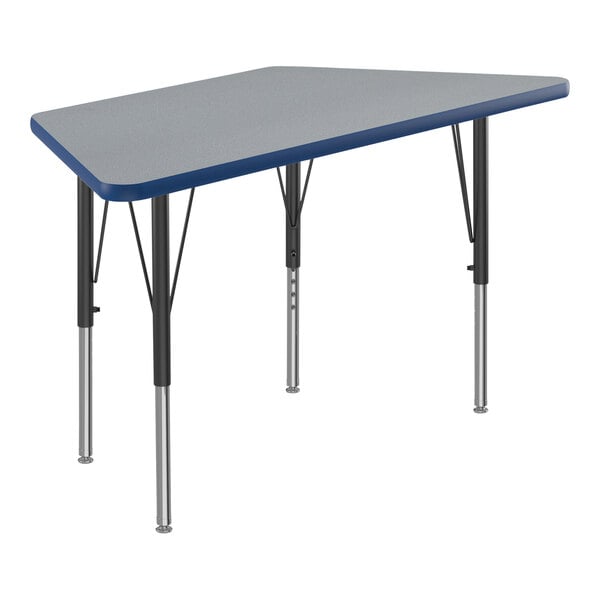 A grey trapezoid-shaped Correll activity table with black legs and blue T-mold.