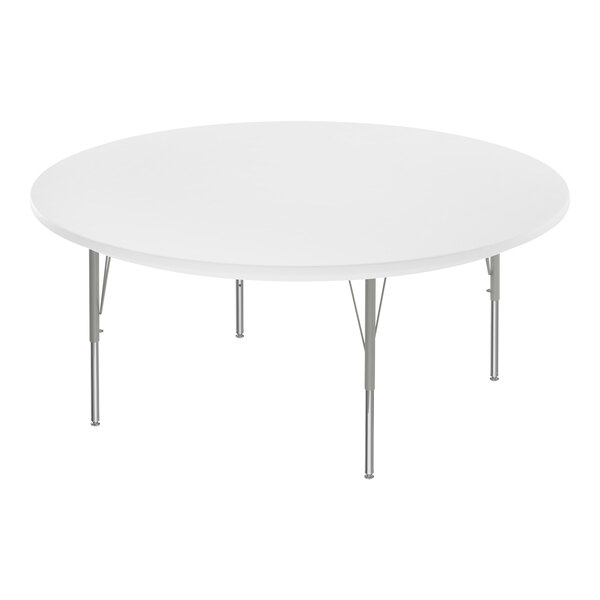 A gray round Correll activity table with silver legs.