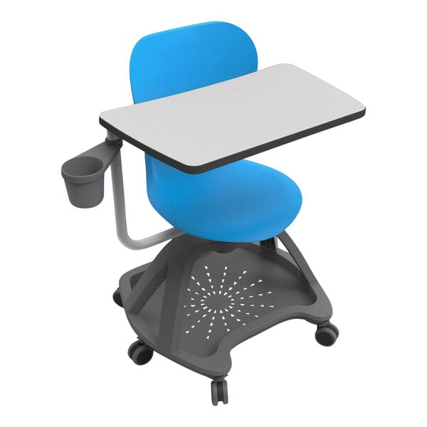 A blue chair and desk with a white tray on the desk.