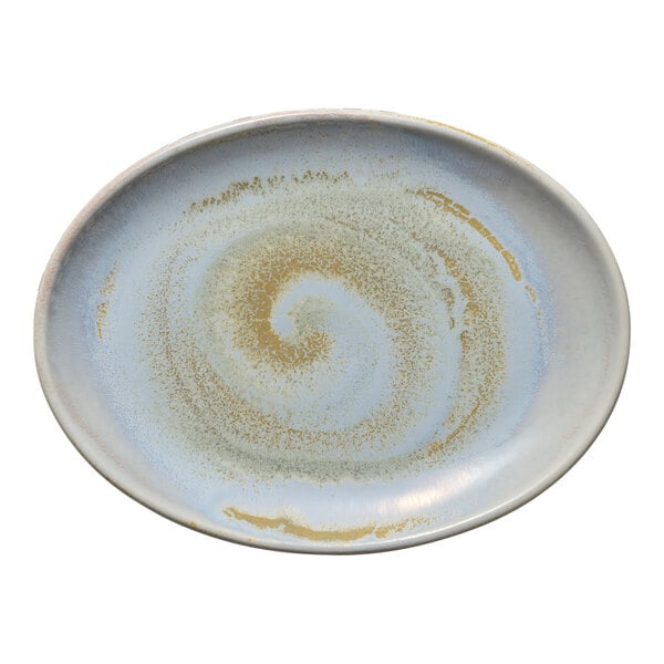 A white porcelain oval platter with blue swirls.