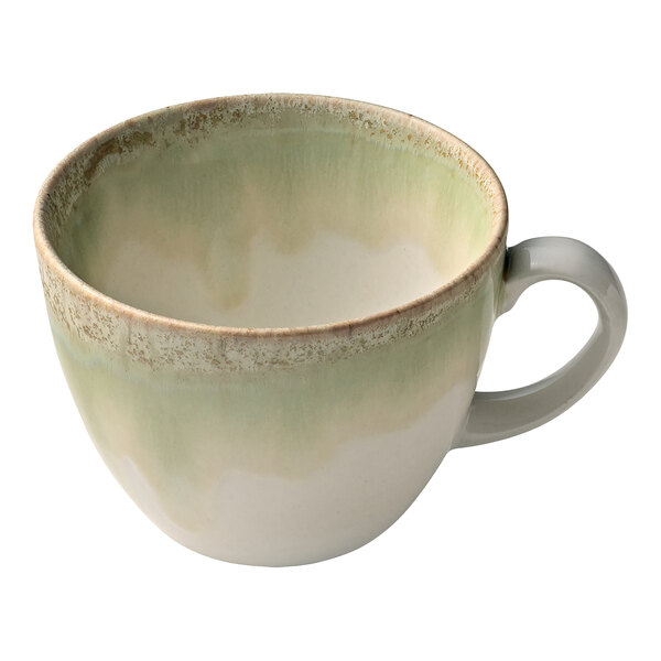 A Heart & Soul white porcelain cup with a green thyme pattern and a handle.