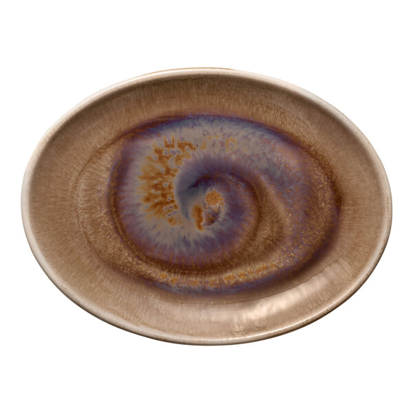 A white porcelain oval platter with brown and blue swirls.