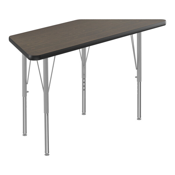 A trapezoid-shaped Correll activity table with silver legs and black trim.