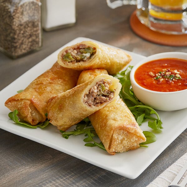The Gourmet Egg Roll Co. 3 oz. Philly Cheesesteak Egg Roll with Peppers and Onions - 60/Case