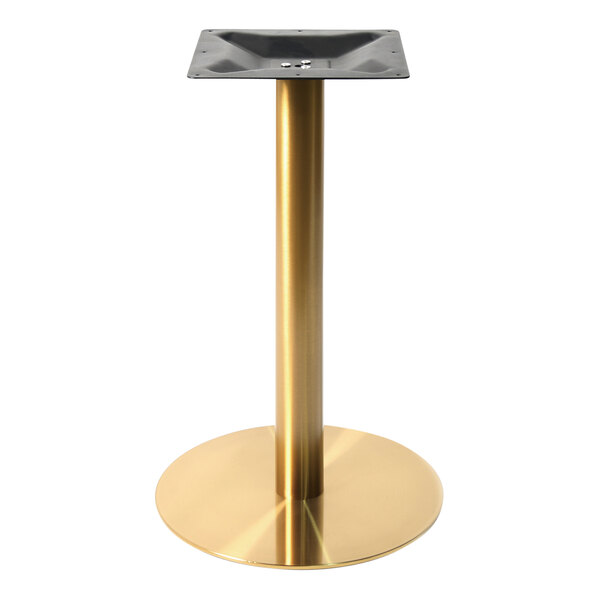 A gold cylindrical Art Marble Furniture table base with a black bottom pole.