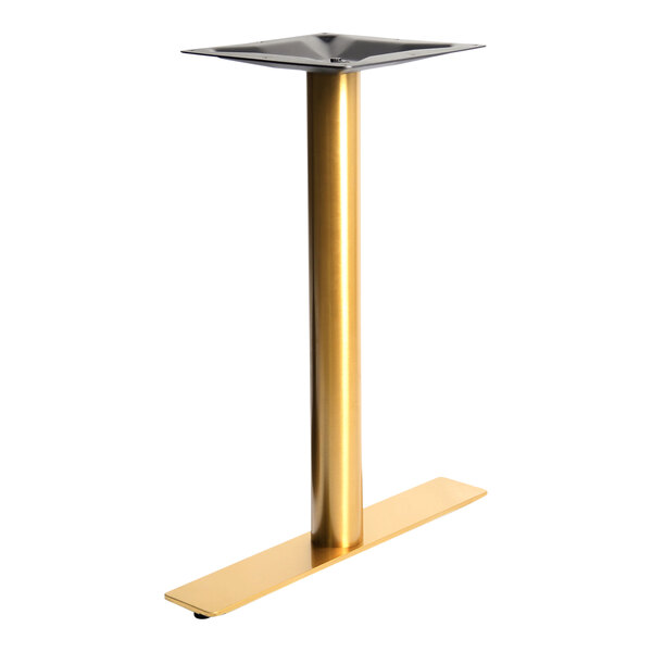 A gold stainless steel cylindrical table base.