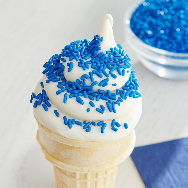 An ice cream cone with Blue Sprinkles on top.