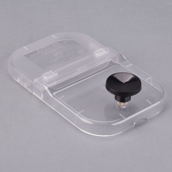 A plastic container with a black knob on it.