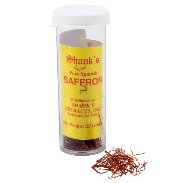 A jar of Shank's Spanish Saffron with a spoon inside.