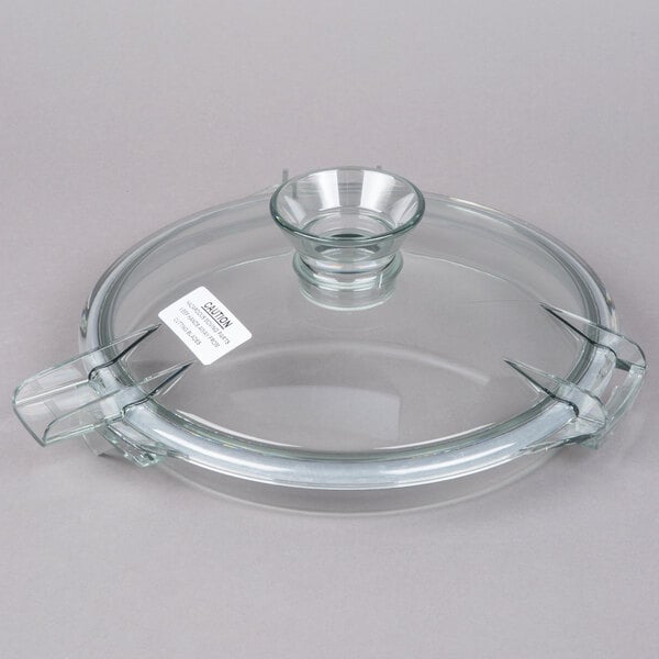A clear glass lid with a handle for a Robot Coupe commercial food processor.