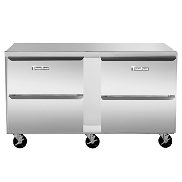 A Traulsen undercounter refrigerator with stainless steel drawers.