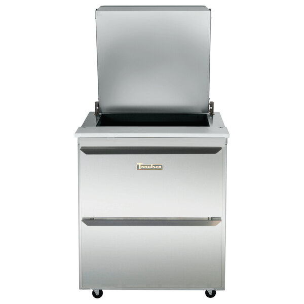 A stainless steel Traulsen refrigerated sandwich prep table with drawers.