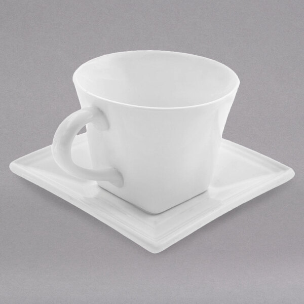 A 10 Strawberry Street Whittier white porcelain flared cup and saucer on a square plate.