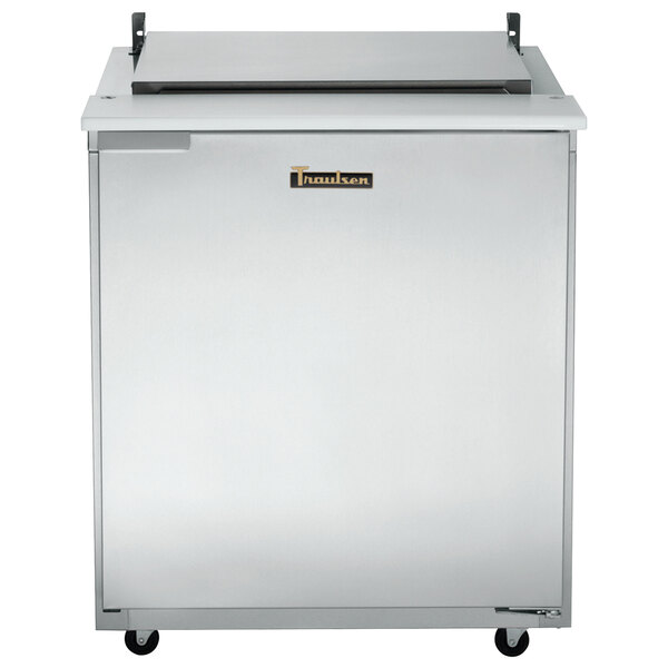 A stainless steel Traulsen refrigerated sandwich prep table with a right hinged door.