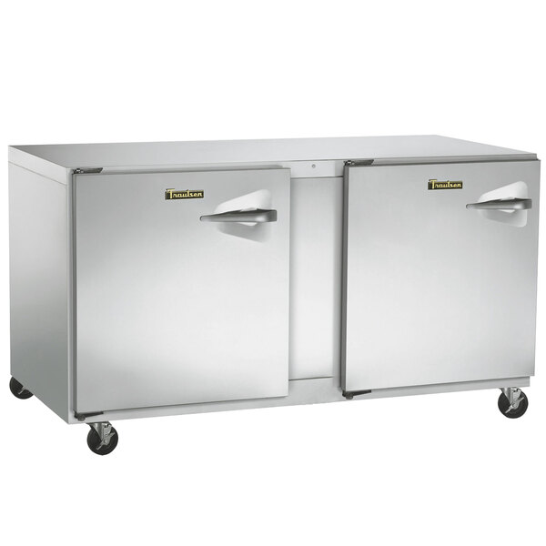 A Traulsen stainless steel undercounter refrigerator with two left-hinged doors.