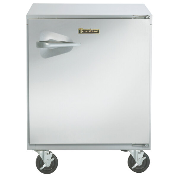 A small silver Traulsen undercounter refrigerator with a stainless steel handle.