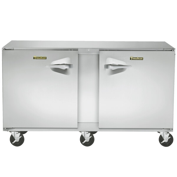 A Traulsen stainless steel undercounter freezer with left and right hinged doors.