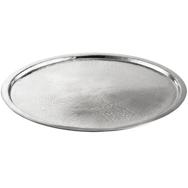 A close-up of a Tablecraft stainless steel round tray with a textured surface.