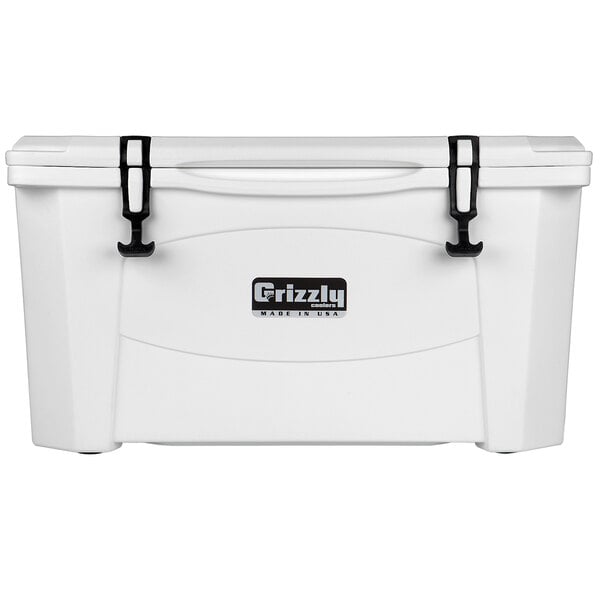 A white Grizzly cooler with black handles.