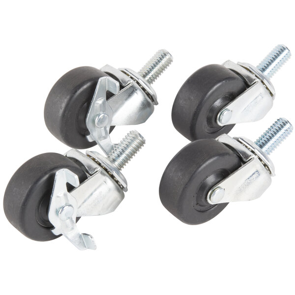 A set of four Traulsen swivel casters with black rubber wheels.