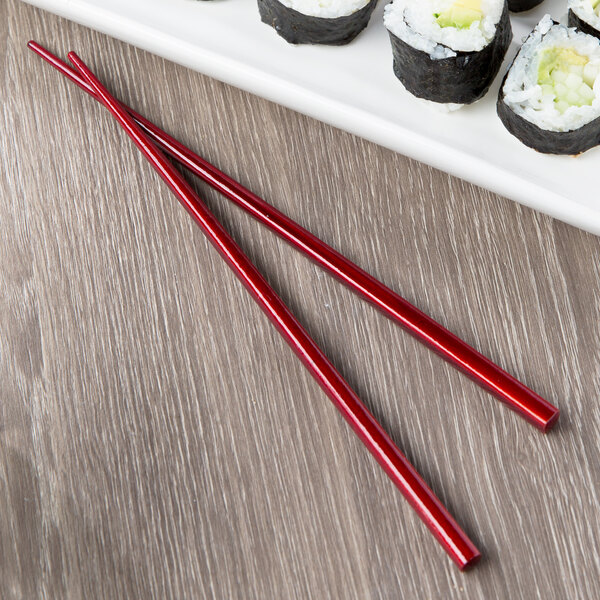 10 Strawberry Street Whittier Bamboo Chopsticks on a plate of sushi.