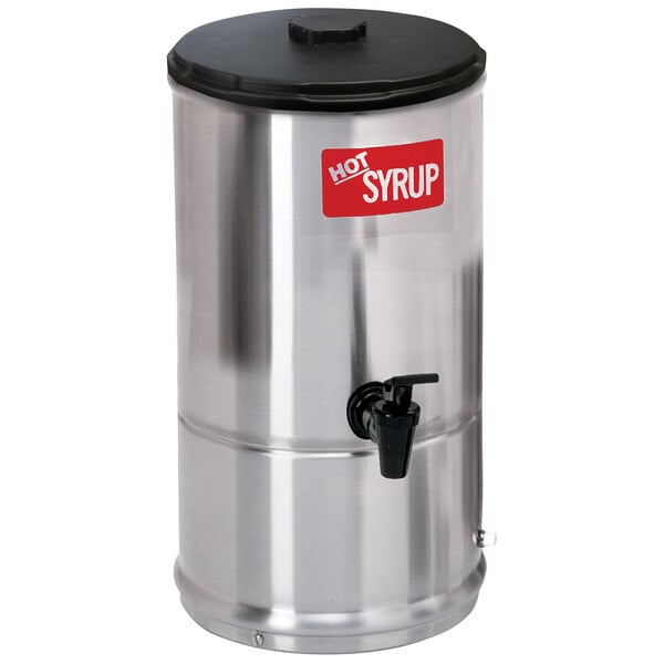 A Curtis stainless steel syrup warmer with a black lid.