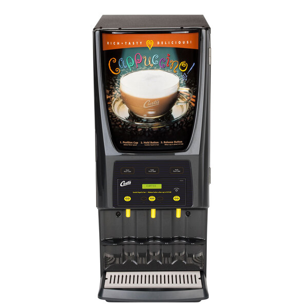 A Curtis Primo Cappuccino Dispenser with a cup of cappuccino on top.