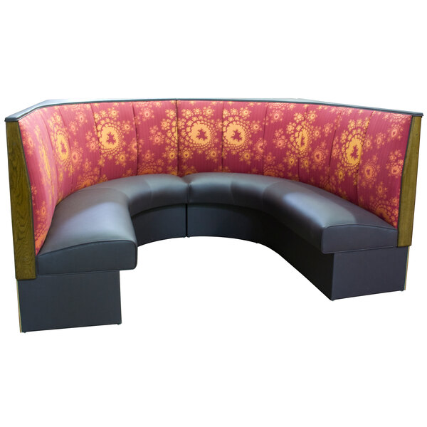 An American Tables & Seating 1/2 Circle Corner Booth upholstered in red and black fabric.