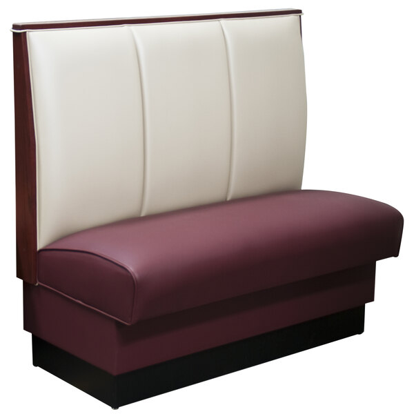 An American Tables & Seating single deuce booth with red and white leather upholstery.