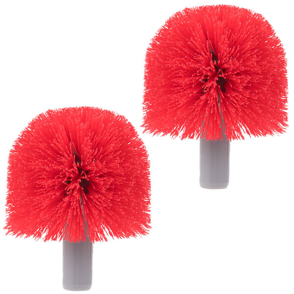 Two red Unger replacement brush heads for an Unger Ergo toilet bowl brush.