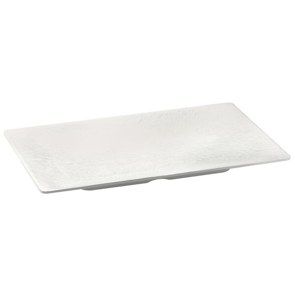 A white rectangular melamine tray with a textured surface and white rim.