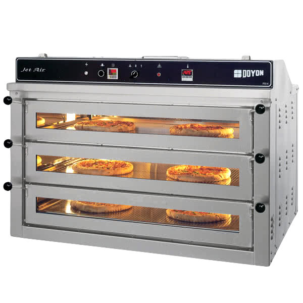 A Doyon triple deck pizza oven with pizzas on four trays.