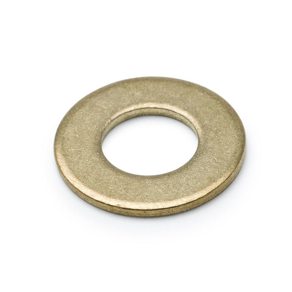 A gold metal washer with a white circle in the middle.