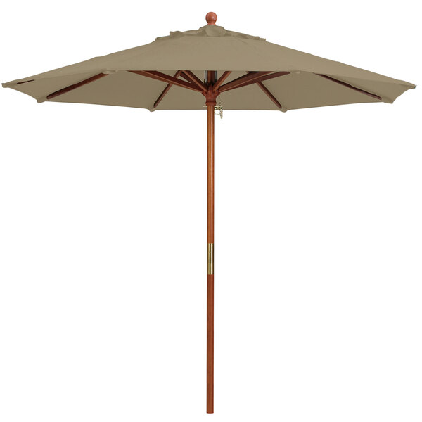 A Grosfillex taupe market umbrella with a wooden pole