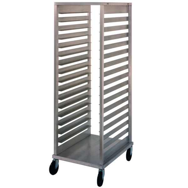 A NU-VU metal sheet pan rack with four shelves on wheels.