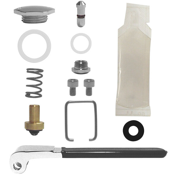 A Fisher spray valve repair kit with various black parts.