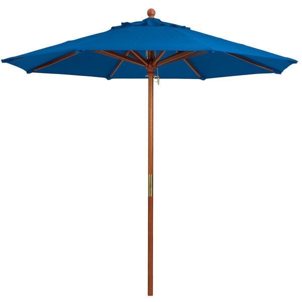 A Grosfillex 9' Pacific Blue Market Umbrella with a wooden pole.