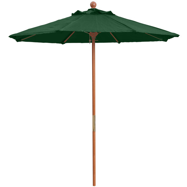 A green Grosfillex market umbrella with a wooden pole.