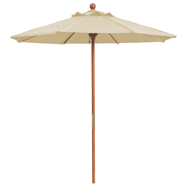 A close-up of a Grosfillex khaki market umbrella with a wooden pole.