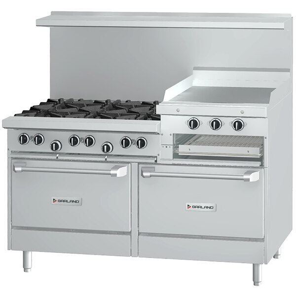 A large stainless steel Garland commercial range with 6 burners, raised griddle, and 2 ovens.