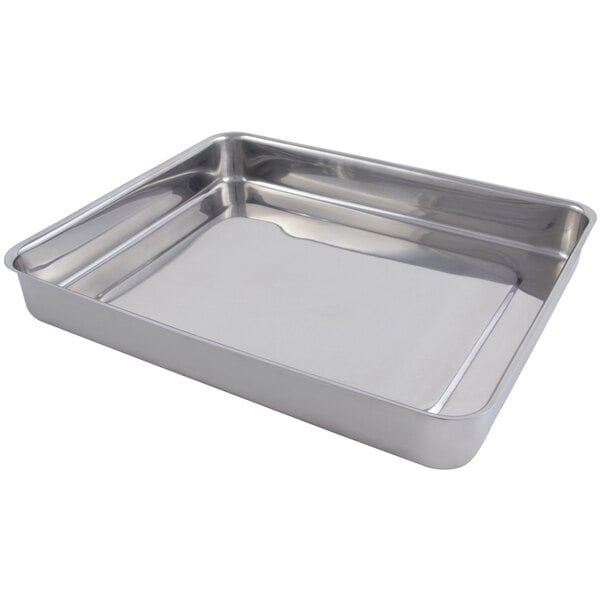 A Bon Chef stainless steel roasting pan on a counter.
