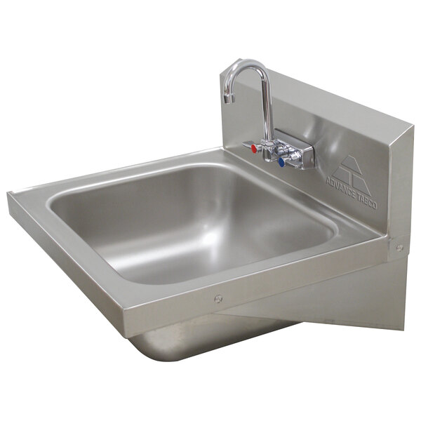 A stainless steel Advance Tabco hand sink with a splash faucet.