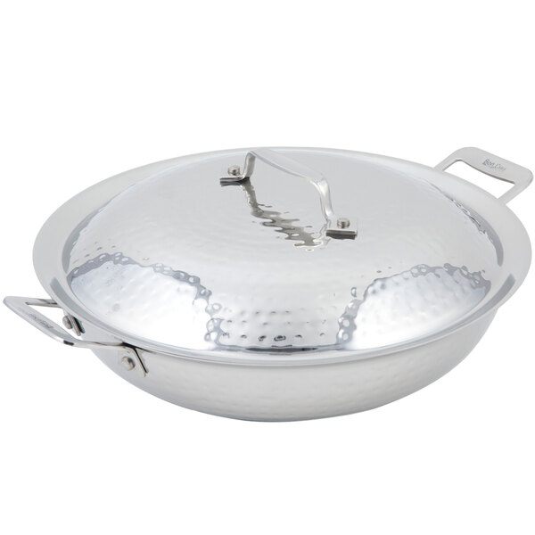 A Bon Chef stainless steel chef's pan with hammered finish and lid.