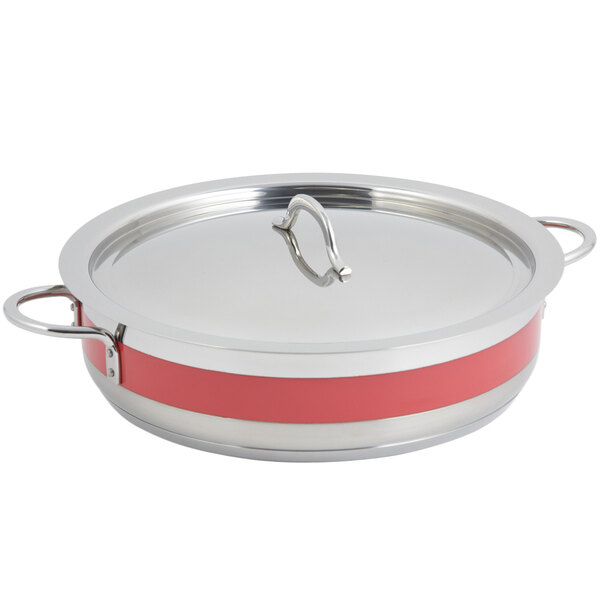 A Bon Chef stainless steel brazier pot with a red cover.