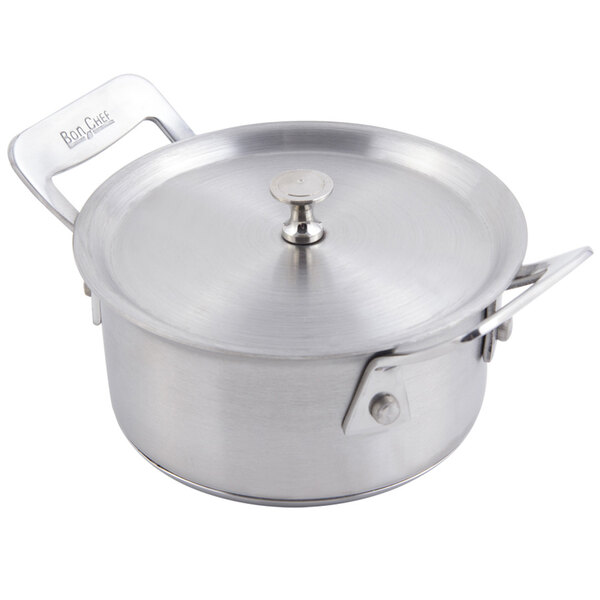 A Bon Chef stainless steel round side dish with a lid.