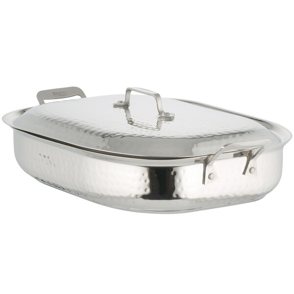 A silver stainless steel Bon Chef roasting pan with handles and a lid.